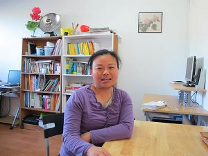 帮同修带孩子的陶琼,自己也修在其中
