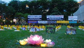Ɖ,新加坡法轮功学员在芳林公园烛光悼念被中共迫害致死的大陆同修'