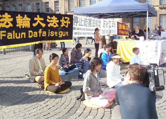 习*近*平访德 法轮功学员呼吁法办江泽民