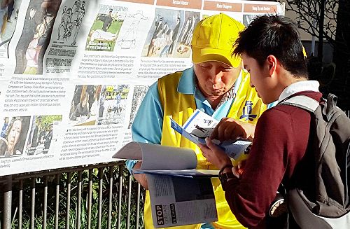 图3:廖李国先生(右)表示:我要做一些事来帮助制止这样残暴的罪行!