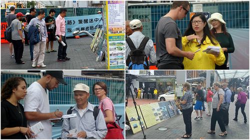 新西兰民众驻足观看真相展板,和学员交谈
