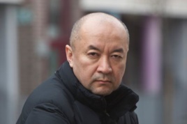 图8:流亡英国的前新疆维吾尔族外科医生安华托帝•博格达 (Enver Tohti)