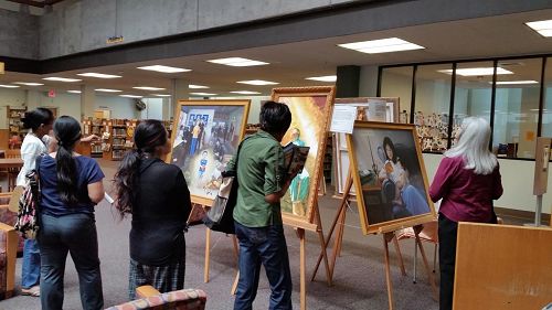'图1-2:旧金山湾区Vallejo市中心的甘迺迪图书馆内,举办了为期一个月的真善忍国际画展'