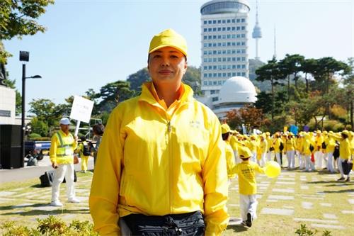 '图24:前奥运游泳名将、韩国法轮功学员黄晓敏'