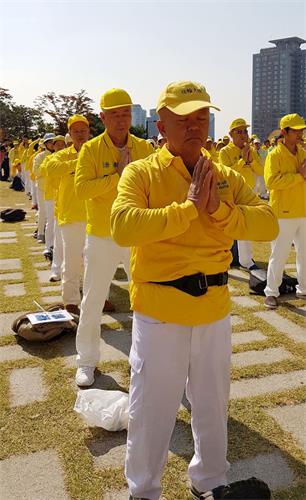 '图26:马来西亚法轮功学员、业主周亚明'