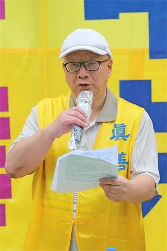 '图3:香港法轮大法佛学会发言人简鸿章呼吁:“各国政府及民众共同制止中共对法轮功的迫害,法办元凶。”'