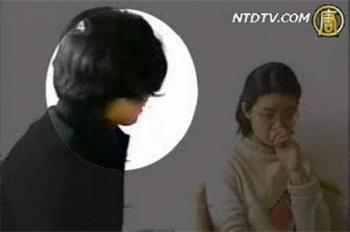 (《焦点访谈》记者李玉强采访石家庄法轮功学员王博)