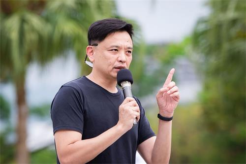'图7:台北市议员洪健益谴责中共罪行,呼吁国际关注中国人权问题。'