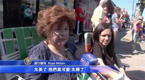 图5:Rose McLean女士非常喜爱法轮功学员的彩旗队。