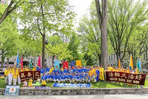 '图5:2019年6月8日,加拿大魁北克省部份法轮功学员在首府魁北克市举行游行活动,庆祝法轮大法弘传27周年。'
