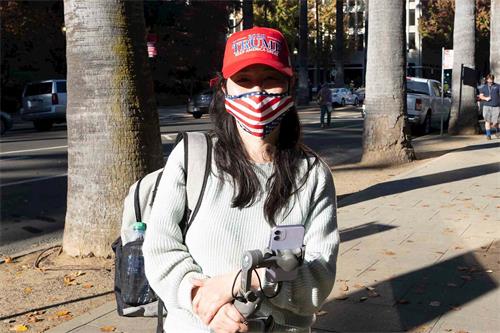 '图5:来自中国大陆的王女士表示,不能让共产主义占领美国。'