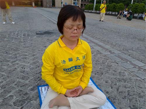 '图12:工程师陈应花希望让更多人看到法轮功学员的勇气和坚持!'
