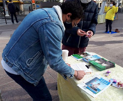 '图5:纳赛尔(Nacer)签名谴责中共迫害法轮功。'
