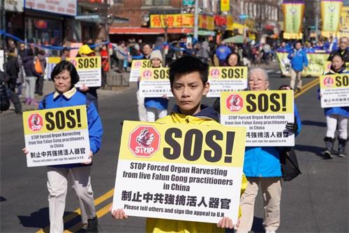 图:法轮功学员游行,制止活摘器官