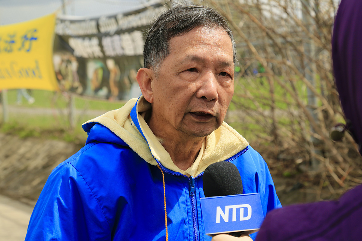 图7:来自台湾的前轮船轮机长陈志洪先生表示,法轮功的和平请愿,对全世界都是有益的。(任侨生/大<span style='max-width:0px!important;margin-left:-4px;color:#eee!important;'>.</span>纪<span style='max-width:0px!important;margin-left:-4px;color:#eee!important;'>.</span>元<span style='max-width:0px!important;margin-left:-4px;color:#eee!important;'>;</span>)