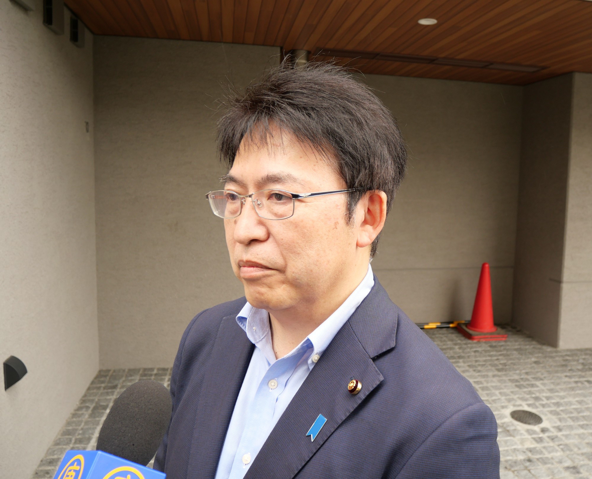 图3:丸山治章先生说:“我愿与中国的法轮功学员一起努力”