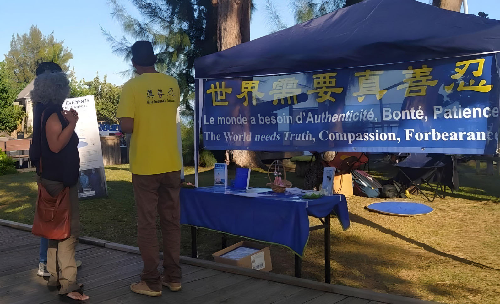 图1~3:二零二四七月二十日,在反迫害25周年之际,法轮功学员们在圣保罗市(St Paul)讲真相。