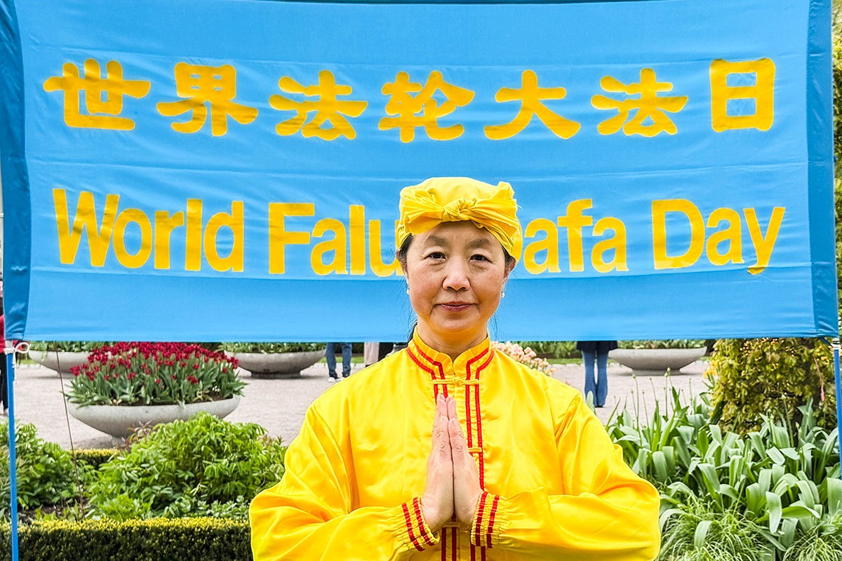 图14:王医生双手合十向师父表达感恩!